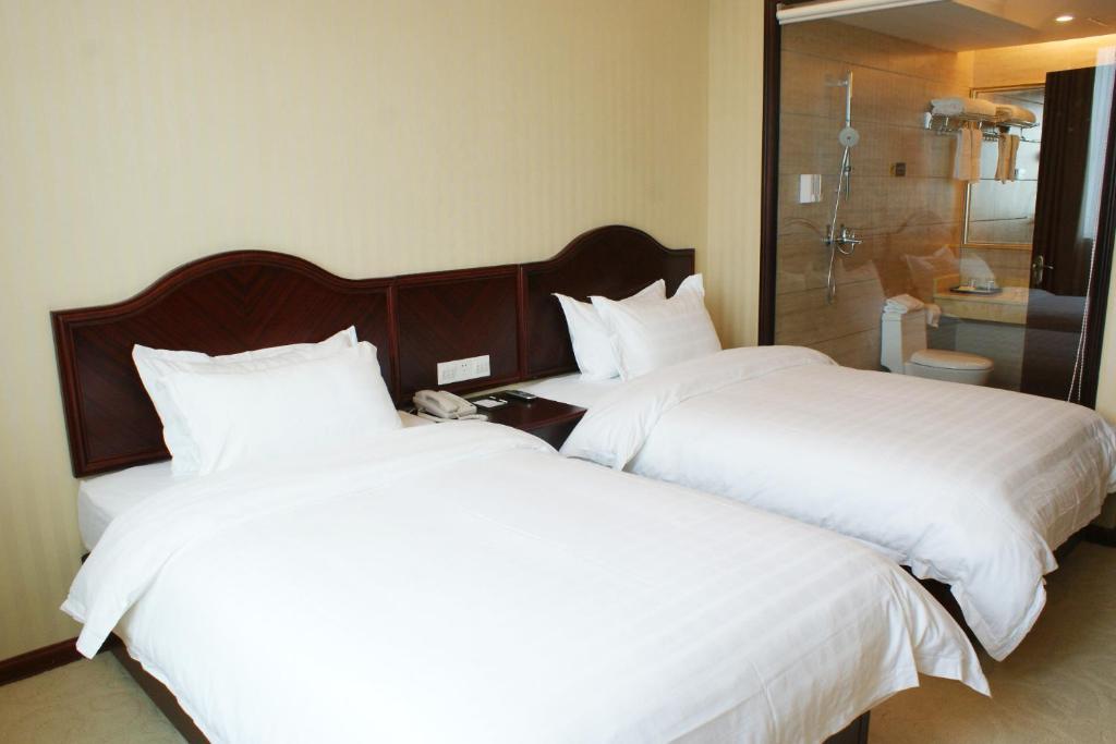 Vienna Hotel Shenzhen Nanxin Road Стая снимка