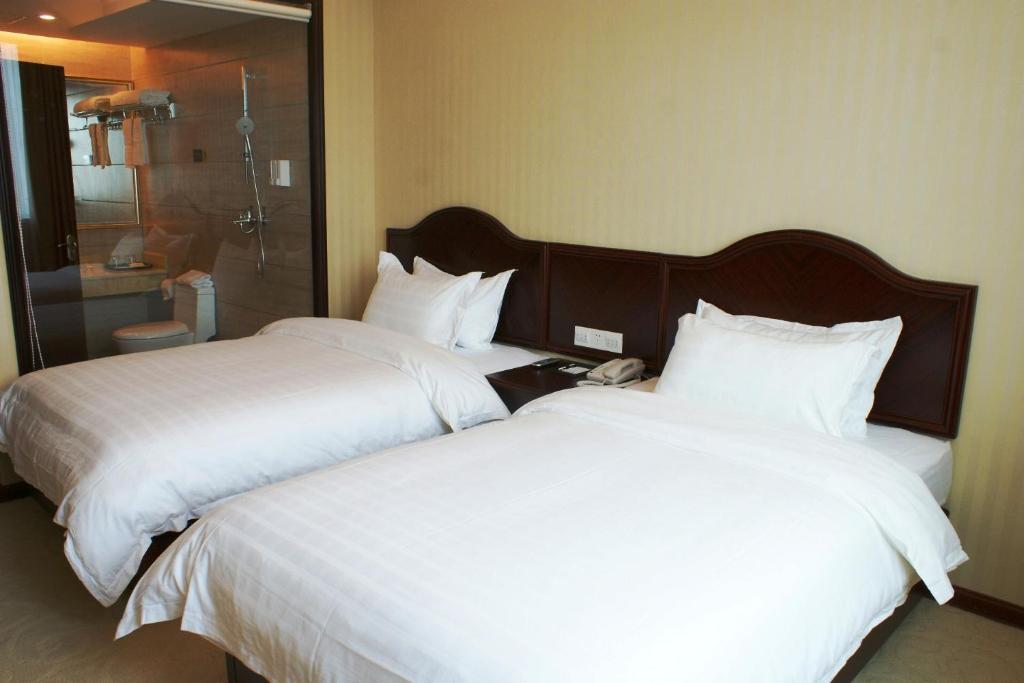 Vienna Hotel Shenzhen Nanxin Road Стая снимка